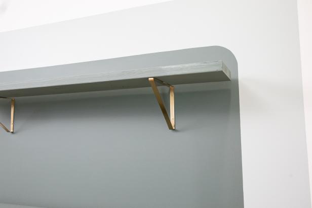 A Shelf on a Green Accent Wall
